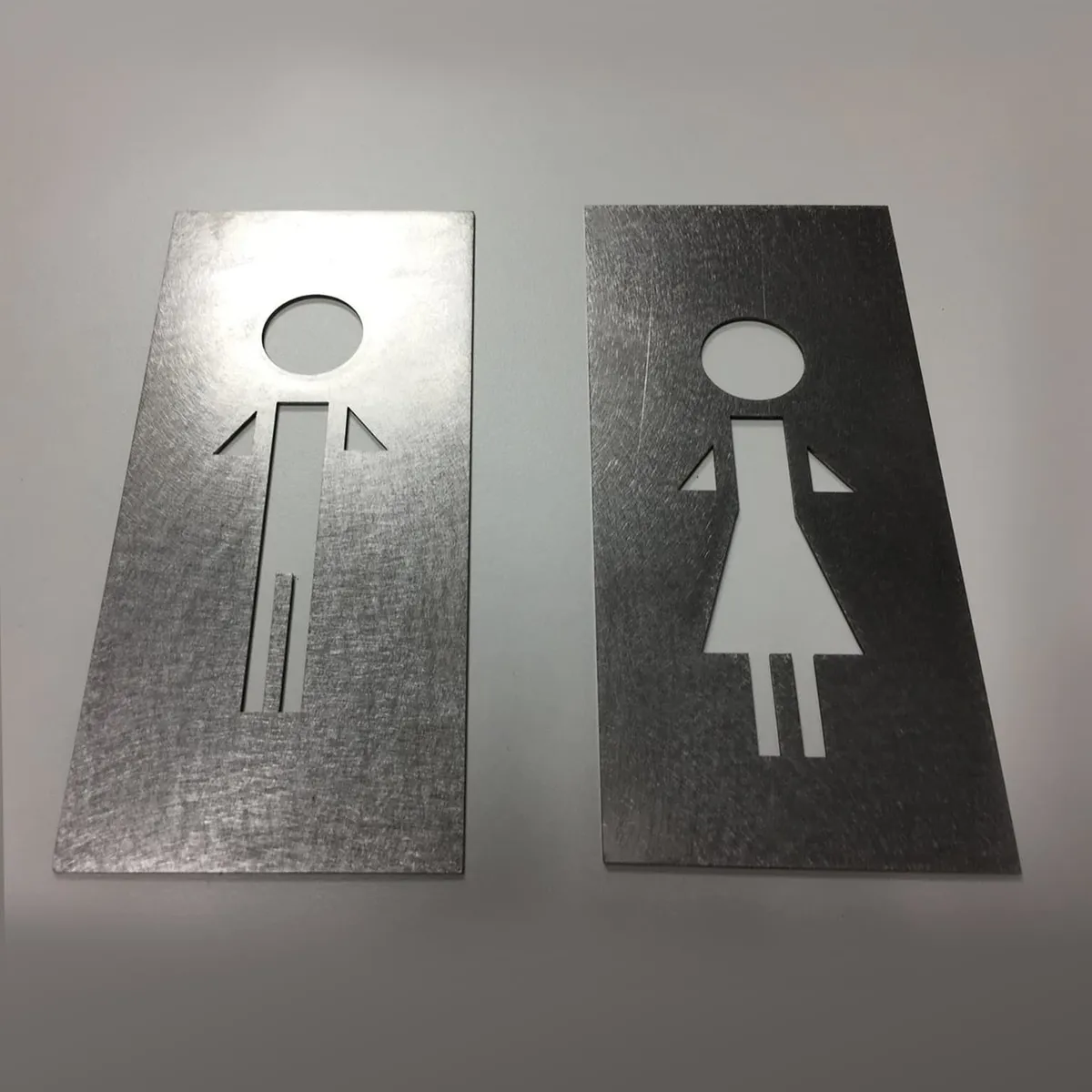 Minimalist stainless WC signs - Raw stainless steel